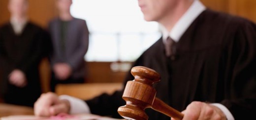 Judge holding gavel in courtroom. Image shot 2010. Exact date unknown.